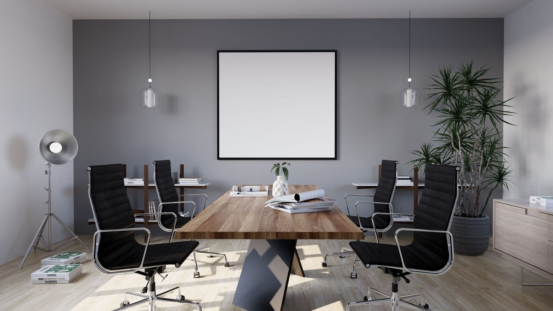 Vergaderruimte met een houten tafel en planten